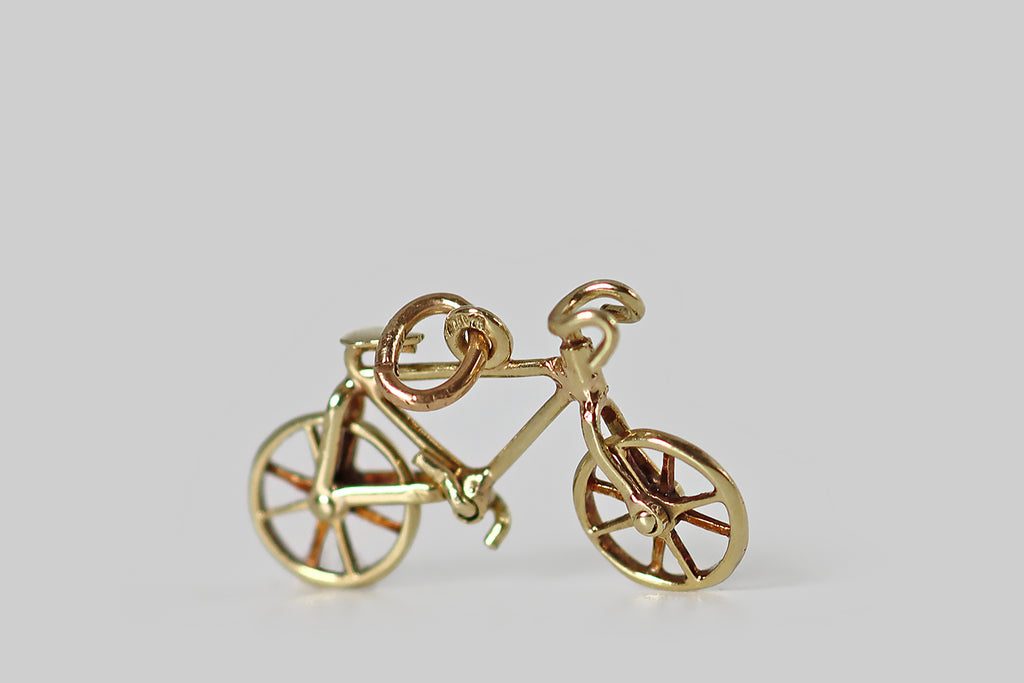 Antique Sloan Co. Moving Bicycle Charm