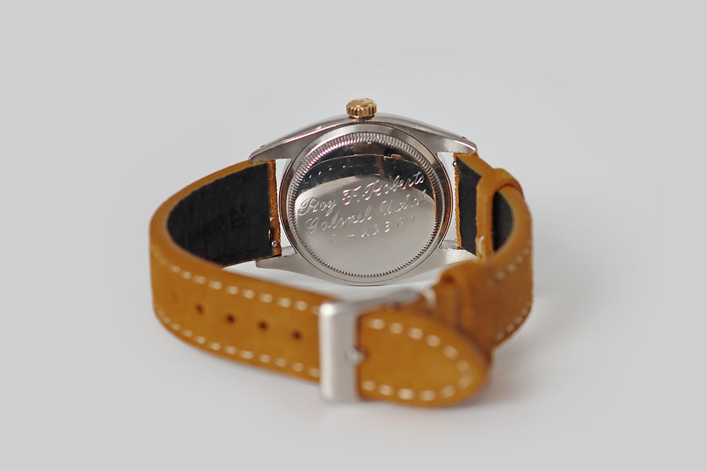 Vintage Watches Portland | Vintage Rolex Portland | Antique Jewelry Portland| Antique Engagement Rings | Poor Mouchette | An all-original, vintage Rolex Datejust Bubbleback wristwatch. This time-capsule watch has its original crystal, hands, crown and beautiful dial which has patinaed over time. The one-of-a-kind dial displays vivid burnt-orange, magenta, red, and purple tones at its center— these painterly hues have a speckled character and, fading into the silver-grey edges of the dial, they give a strong