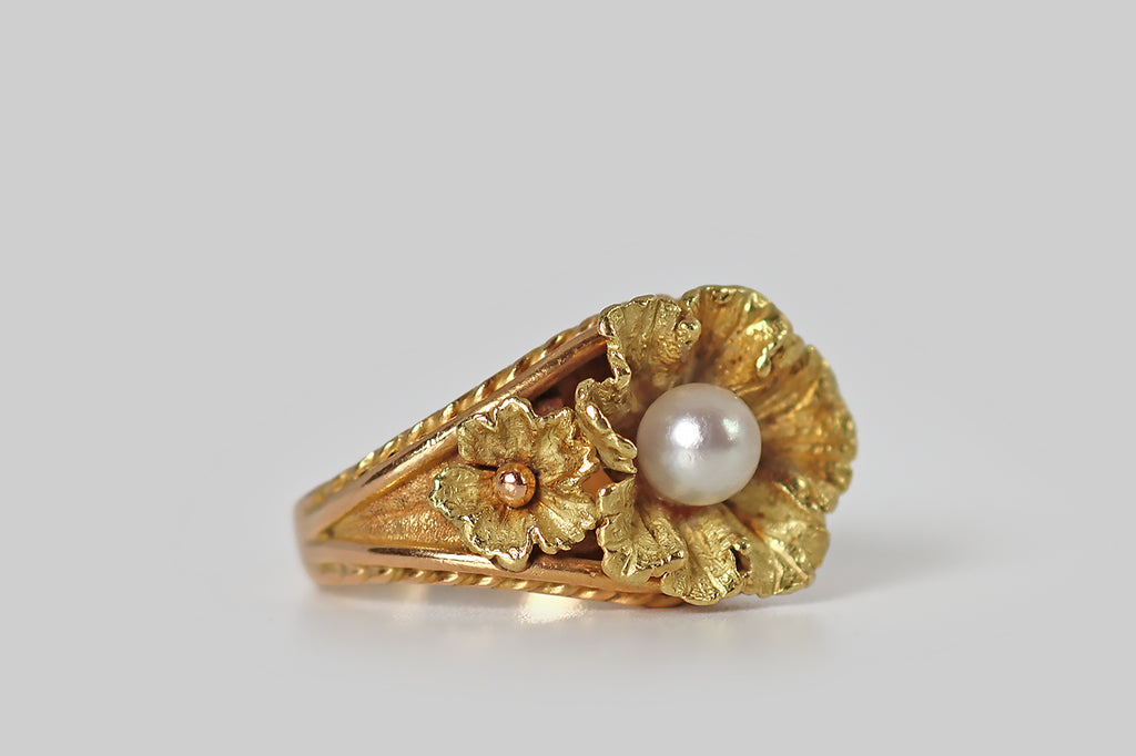 Poor Mouchette | Curated Antique Jewelry, Vintage Jewelry & Engagement Rings | Portland, Oregon | A bold, vintage 1960s ring, modeled in 18k rose gold &amp; 18k yellow gold, whose central element— a pair of beautiful, fleshy, finely-textured blossoms— recalls the floral jewelry of the Victorian era. These vibrant, yellow-gold flowers have lacy, irregular petals, and wonderful dimensionality— the larger blossom 