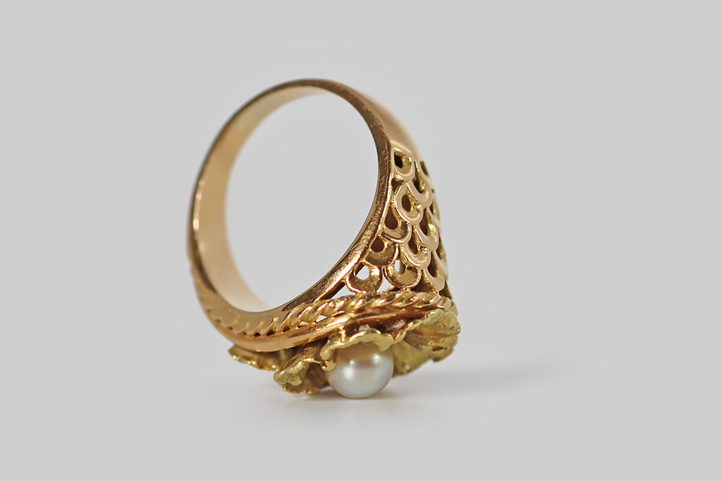 Poor Mouchette | Curated Antique Jewelry, Vintage Jewelry & Engagement Rings | Portland, Oregon | A bold, vintage 1960s ring, modeled in 18k rose gold &amp; 18k yellow gold, whose central element— a pair of beautiful, fleshy, finely-textured blossoms— recalls the floral jewelry of the Victorian era. These vibrant, yellow-gold flowers have lacy, irregular petals, and wonderful dimensionality— the larger blossom