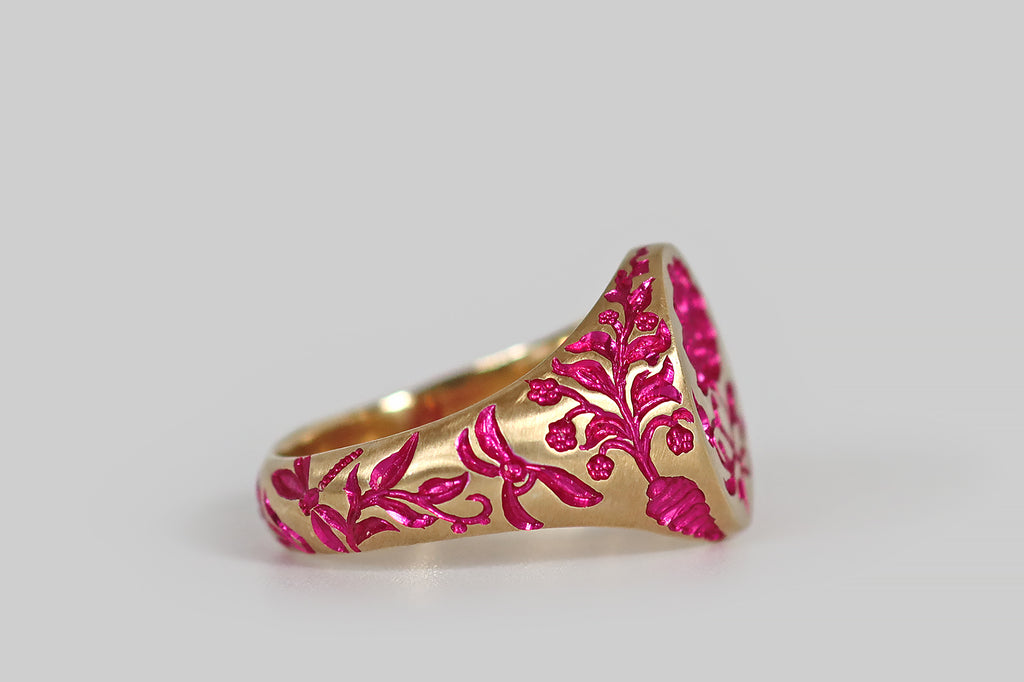 Poor Mouchette | Curated Antique Jewelry, Vintage Jewelry & Engagement Rings | Portland, Oregon | A contemporary signet ring, modeled in 9k yellow gold and hand-engraved by the artist Castro Smith. This ring features a garden motif— a peony with curvaceous foliage decorates the ring face, while a carrot, a watering can, leaves and dragonflies populate the ring's shoulders and shank. An additional, secret carrot lives inside 