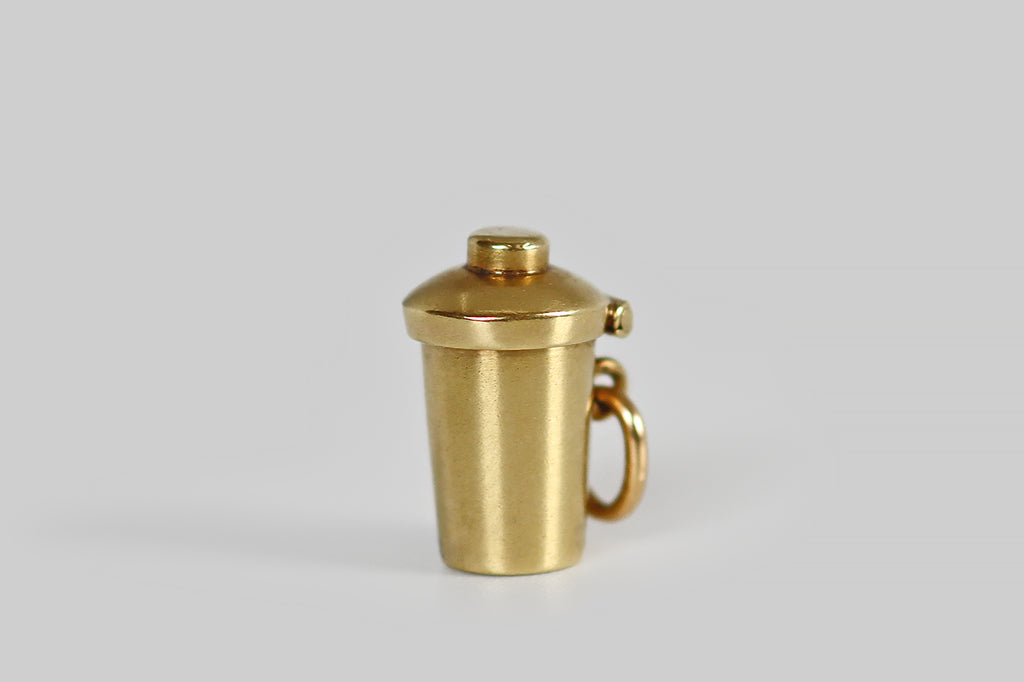 Antique Jewelry Portland, Vintage Jewelry Portland , Antique Engagement Rings | Poor Mouchette | A dainty, vintage, articulated charm, made in 14k yellow gold by the well-known New York jewelers Sloan &amp; Co. This little charm is made to resemble a cocktail shaker, with a hinged lid. Open the lid, and a tiny satan rises up from within! This little devil wears a devious expression, and a pointy, upturned mustache. 