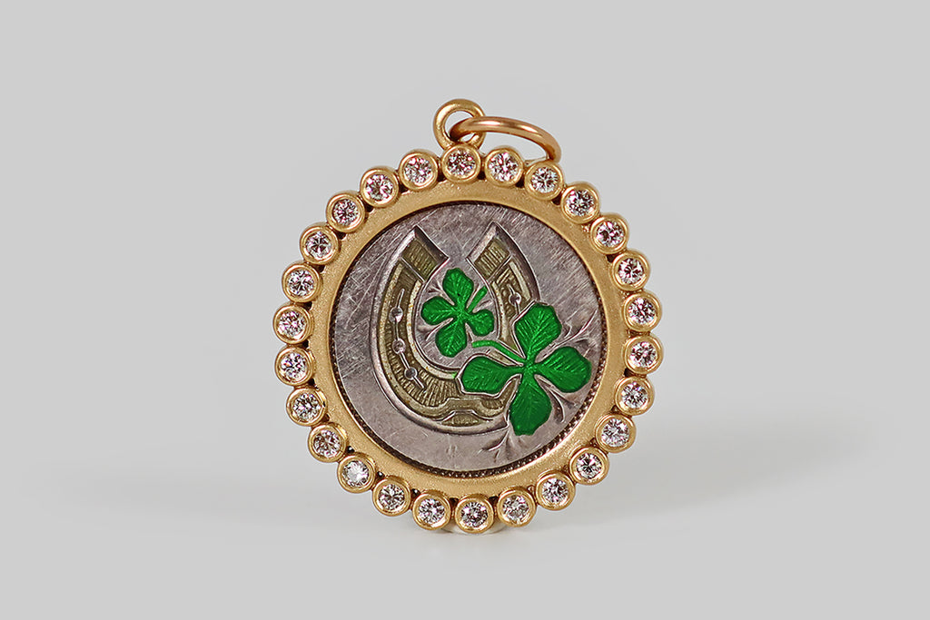 Poor Mouchette | Curated Antique Jewelry, Vintage Jewelry & Engagement Rings | Portland, Oregon | A turn of the century silver love token, decorated with a hand-engraved horseshoe and a pair of four leaf clovers! This charming "good luck" love token is embellished with enamel in kelly green and very-subtle, translucent yellow. we have mounted it in a newly-hand-made 18k gold frame