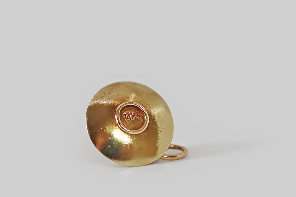 Antique Jewelry Portland, Vintage Jewelry Portland , Antique Engagement Rings | Poor Mouchette | A dainty, vintage charm, modeled as a teacup and saucer, in 14k yellow gold. This miniature cup and saucer is beautifully made— it is well-suited to anyone who takes tea over tipple, or tipple in their tea!
