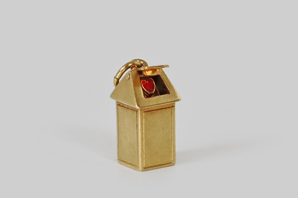 Antique Jewelry Portland, Vintage Jewelry Portland , Antique Engagement Rings | Poor Mouchette | An adorable vintage trash can charm, fabricated in 14k yellow gold, by the well-known New York Jewelers Sloan &amp; Co. This little trash can is tall and rectangular, with a swinging top, and hiding inside its swing-top (on both side)— a pair of tiny, red, enamel hearts!