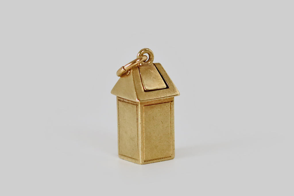 Antique Jewelry Portland, Vintage Jewelry Portland , Antique Engagement Rings | Poor Mouchette | An adorable vintage trash can charm, fabricated in 14k yellow gold, by the well-known New York Jewelers Sloan &amp; Co. This little trash can is tall and rectangular, with a swinging top, and hiding inside its swing-top (on both side)— a pair of tiny, red, enamel hearts!