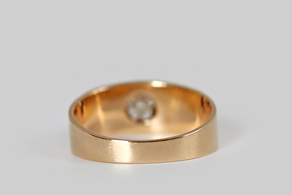 Antique Jewelry Portland, Vintage Jewelry Portland , Antique Engagement Rings | Poor Mouchette | A classic, low-profile, Victorian-era "belcher claw" engagement ring, modeled in 14k rosy yellow gold, and set with an especially pretty .60 carat Old European cut diamond (H/I - VS1). This old darling is designed as a wide, band-style ring, with an integral six-prong mount. The six prongs hold its diamond aloft, over the negative space