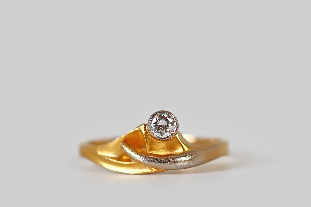 Antique Jewelry Portland, Vintage Jewelry Portland , Antique Engagement Rings | Poor Mouchette | A striking, vintage modernist ring, by the beloved design house Lapponia Finland, modeled in bloomed 18k yellow gold and accented with platinum. This ring features a small, sparkling brilliant cut diamond (E/F, VS). The diamond is set in a long, platinum tube bezel, so it reads like a beacon, beaming out over the organic forms beneath it.