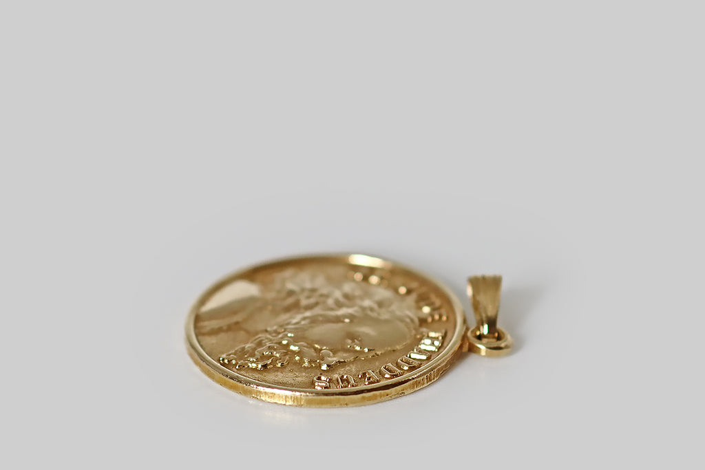 Antique Jewelry Portland, Vintage Jewelry Portland , Antique Engagement Rings | Poor Mouchette | A very cool mid-20th-century St. Jude Thaddeus Pendant, modeled in 14k yellow gold. This vintage catholic medal features an especially handsome profile of the saint, in relief— he wears a dignified expression; he has long, wavy hair, and a long, wavy, pointed beard. The St. Jude's name appears in raised block letters