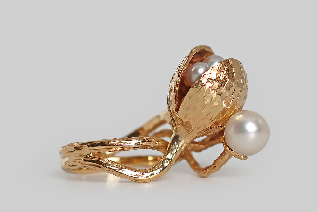 Poor Mouchette | Curated Antique Jewelry, Vintage Jewelry & Engagement Rings | Portland, Oregon | A wild, mid-20th-century cocktail ring, modeled in 14k yellow gold, as a bountiful, oceanic arrangement that includes a half-open oyster shell, spiky corals, and five luminous, white pearls.