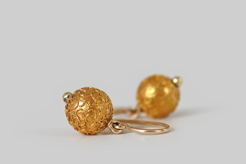 Poor Mouchette | Curated Antique Jewelry, Vintage Jewelry & Engagement Rings | Portland, Oregon | A sweet pair of Victorian era orb earrings, modeled in 15k yellow gold and decorated with applied wirework, in the Etruscan style. This twisted wire decor presents as a somewhat unruly, confetti-like collection of apostrophes populating the surface of each orb— they are cheerful and casually arranged