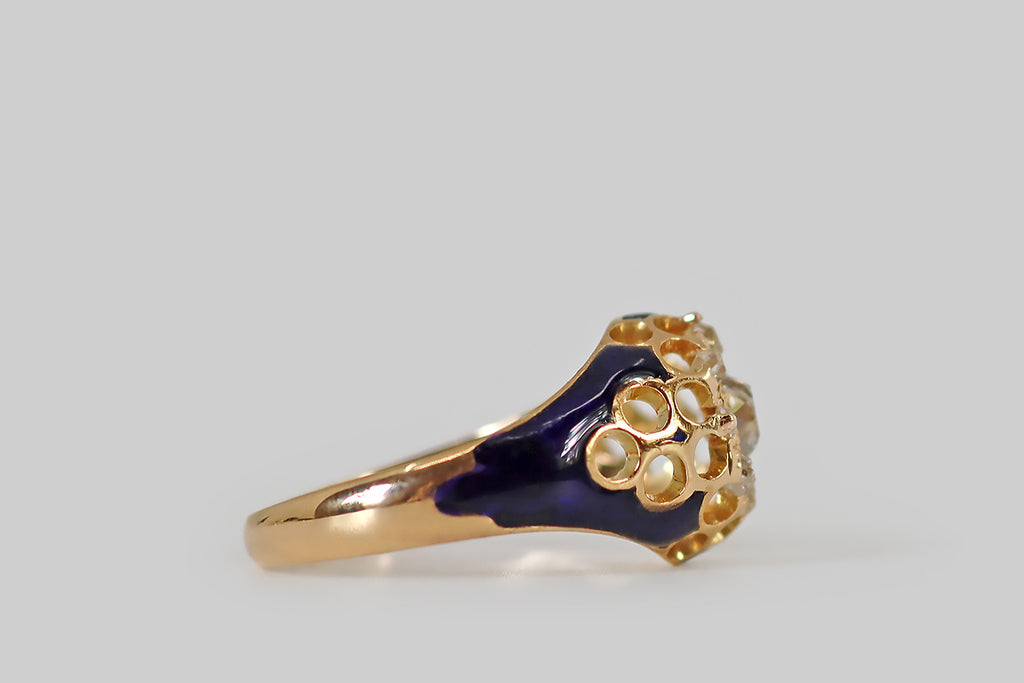 Antique Jewelry | Vintage Jewelry | Antique Engagement Rings | Portland, OR | Poor Mouchette A beautiful, enameled, Victorian-era, diamond cluster ring, modeled in 18k yellow gold, whose nine old mine cut diamonds form a subtle flower shape at the center of the ring face. This diamond flower is surrounded by a honeycomb of open circles