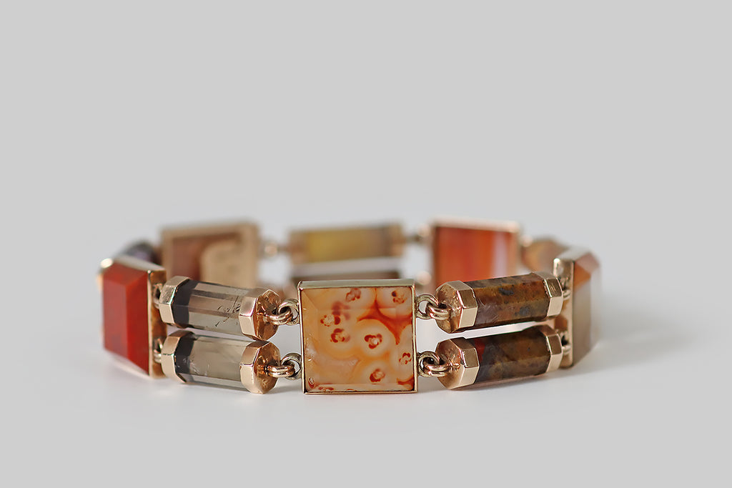Antique Jewelry Portland, Vintage Jewelry Portland , Antique Engagement Rings | Poor Mouchette | An exceptional, Victorian-era Scottish “pebble” bracelet, fabricated in 12k yellow gold by the important Scottish jewelers Marshall and Sons, of Eidenburgh. This bracelet is set with beautifully-figured agate, jasper, and quartz specimens, which are set in full bezels and linked together.