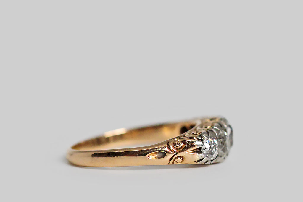 Poor Mouchette | Curated Antique Jewelry, Vintage Jewelry & Engagement Rings | Portland, Oregon | A beautiful, Victorian era, five stone ring, modeled in 18k yellow gold with a silver top. This ring is set with a graduating series of soulful, old mine cushion cut diamonds— these hand-cut diamonds have the steep crown facets, small tables, and open culets that distinguish this beloved old cut.